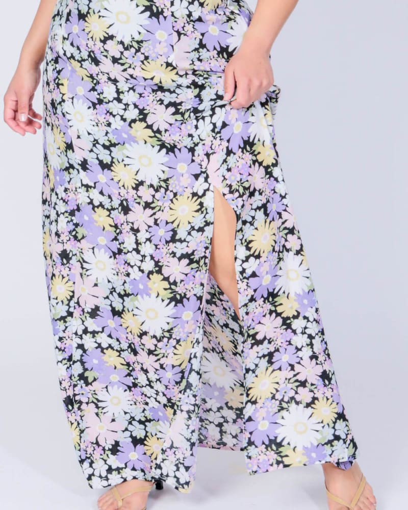 Front of a model wearing a size L Cher Maxi Skirt in Daisy Print by LuvMeMore. | dia_product_style_image_id:266727